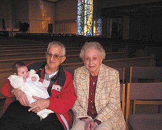 Thomas and Anne Mirante Jr. of Cornersburg attend the baptism of their first and only grandchild, Trinity Mirante, also of Cornersburg. Photo was submitted by their daughter-in-law, Valerie Mirante.