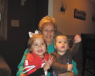 Two-year-olds Leah Hudak, daughter of Joe and Jen Hudak, and Aubree Philibin,daughter of Ryan and Danielle Philibin, are spending time with their great grandmother, Phyllis Bellino, on her 89th birthday.