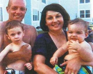 Frank and Vicky Hoffman of North Lima enjoy a day at Port Clinton with their grandsons, A.J., 2, of Charlotte, and Caleb, 1 1/2, of Toledo.