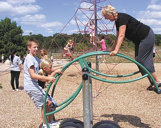Drew and Delaney Kibler of Noblesville, Ind., are giving their grandmother, Lynne Challenger Kovacs of Youngstown, a lift!