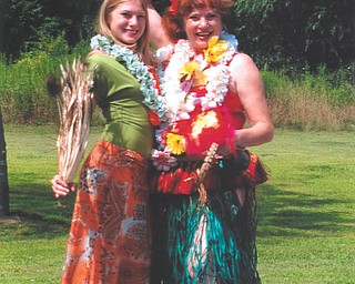 Leanna Hartsough, a freshman at YSU, and her grandma, Lana Van Auker of Canfield, recently performed the hula dance for residents at Hampton Woods Nursing Center in Poland and Blossom Nursing and Rehab Center in Salem.