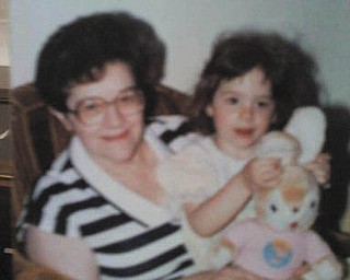 This is a picture of Tara Fisher as a little girl with her grandma, Hazel O'Hara.