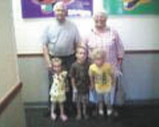 Bill and Mary Lou Kerr are with their grandson, Timmy Kerr, and great-grandkids, Zane and Addison Householder.