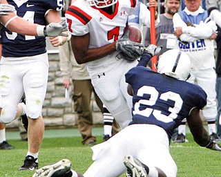 ROBERT K. YOSAY | THE VINDICATOR..YSU #7 Ely Ducatel Dives for the end zone for YSU Second TD as PSU #23 S. Obeng-Agyapong (ok) Misses te tackle.YSU LOSES 44-14 PENN STATE at BEAVER STADIUM IN HAPPY VALLEY.-30