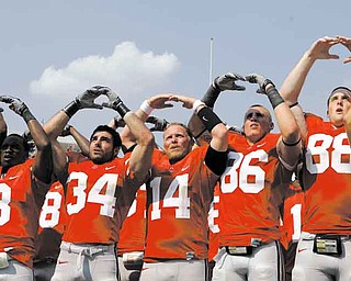 Ohio State players sing "Carmen Ohio" after their 42-0 win over Akron in an NCAA college football game Saturday, Sept. 3, 2011, in Columbus, Ohio. (AP Photo/Jay LaPrete)