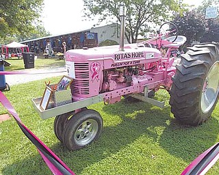ROBERT K. YOSAY | THE VINDICATOR..Ritas tractor sits in honor of her fight against breast cancer - .Day THREE Friday - of the Canfield Fair Sept 2-.. -30-