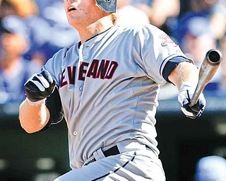 Cleveland Indians' Shelley Duncan hits a two-run home run during the eighth inning of a baseball game against the Kansas City Royals in Kansas City, Mo., Sunday, Sept. 4, 2011. It was Duncan's second homer of the game. (AP Photo/Orlin Wagner)