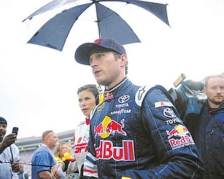 Sprint Cup Series driver Kasey Kahne walks to the garage before the NASCAR Atlanta Sprint Cup AdvoCare 500 auto race, Sunday, Sept. 4, 2011, at the Atlanta Motor Speedway, in Hampton, Ga. (AP Photo/Rainier Ehrhardt)