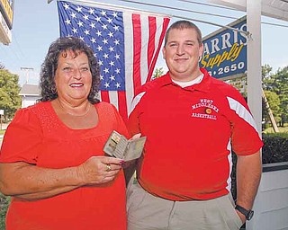 Virginia L. and Jerald A. Barris of West Middlesex, Pa., hold a silver cigarette case that was carried by their ancestor, Army doughboy Willis William “Bill” Barris in France during World War I. The cigarette case was found in an old metal lockbox passed down through generations of Barris men to Jerald A.