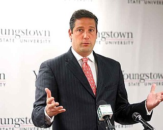 U.S. Rep. Tim Ryan, D-17th, of Niles explains why the new solar panel system also benefitted local companies, who supplied some of the materials. Ryan spoke Tuesday as Youngstown State University unveiled the system.