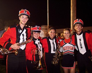 Band members Matt Wansack, Kayla Bornemisza, Ashley Hudzik, and Anthony Buzzacco, and cheerleader Sam Lawless celebrate Springfield's victory over Youngstown Christian