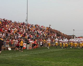 Packed visitors side