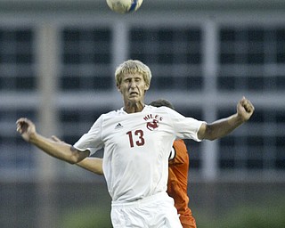 William d Lewis The Vindicator NilesChris Pack heads the ball during Thursday action with Howland at Niles.