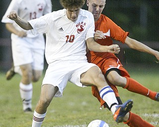 William d Lewis The Vindicator NilesCJ Cicero, left, and Connor Gilmour, left, and Kyle Watson of Howland go for the ball during Thursday action at Niles.