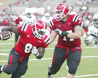 ROBERT K. YOSAY | THE VINDICATOR..YSU #9 Adaris Bellamy breaks for a TD cruising 13 yards in second quarter action as #77 D.J. Main protects him- as Valpo # 37 Mike Pando can only look on-.-30