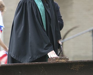 ROBERT K. YOSAY | THE VINDICATOR --..Choir Member Cathy Price makes the sign of the cross as she touches the beam from the WTC..Solemn Service as St Patricks Church in Youngstown, commemerated 9-11 with a prayer, pledge of allegiance, a moment of silence and a flag to Bazetta fire dept by Rep Tim Ryan - the beam from the WTC was then touched by parioshners in a quiet solemn moment..--30-..(AP Photo/The Vindicator, Robert K. Yosay)