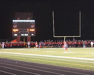 football team w band at end of game w alma mater in end zone win or lose
 