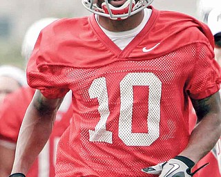Ohio State’s Corey Brown runs a drill during a practice in Columbus. Brown, running back Jordan Hall and defensive back Travis Howard were suspended for violating NCAA rules by taking $200 at a Cleveland charity event earlier this year.