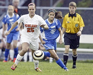 William D. Lewis  The Vindicator Howland's Jenna dorchock goes for the ball during 9-14-11 game with Poland at Howland.