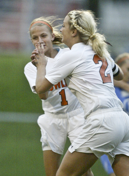William D. Lewis  The Vindicator  Howland's Olivia Nicholas, RIGHT #2 gets congrats from Joedan entler after scoring the first goal of the game Wed against Poland.