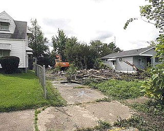 Rubble is all that remains of the house that once stood at 1029 Norwood Ave. on Youngstown’s North Side. City crews demolished the dilapidated structure Friday after neighbors had complained about its deteriorating condition for years.