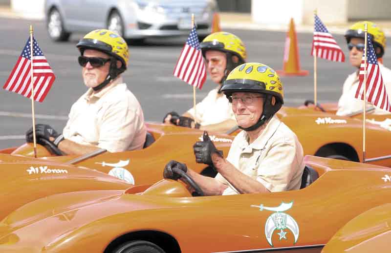 About 3,000 Shriners from six states and Canada traveled to Boardman on Friday and ran motorcycles and mini-Corvettes  in and out of orange cones in the former Value City parking lot. The Great Lakes Shrine Association Convention held in the Mahoning Valley this week.  