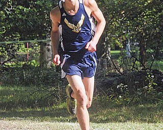 McDonald’s Pat Kunkel finished sixth to help the Blue Devils win the Division III boys portion of the Spartan Invitational in Boardman.