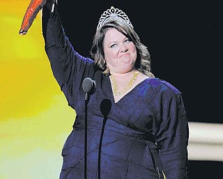 Melissa McCarthy accepts the award for outstanding lead actress in a comedy series for “Mike and Molly”at the 63rd Primetime Emmy Awards on Sunday, Sept. 18, 2011 in Los Angeles. (AP Photo/Mark J. Terrill)