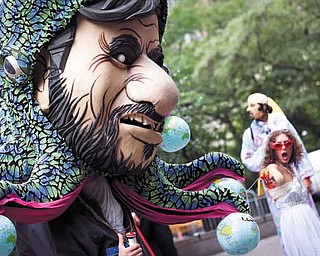 Demonstrators participating in an anti-Ahmadinejad rally outside the UN headquarters mock controversial Iranian president Mahmoud Ahmadinejad before he is scheduled to speak at the U.N. General Assembly, Thursday, Sept. 22, 2011, in New York. (AP Photo/John Minchillo)