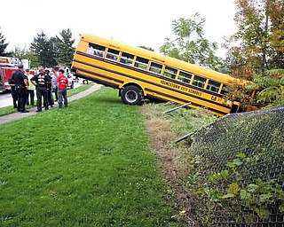 Police and Youngstown City Schools officials are investigating a one-vehicle school bus accident on the West Side on Monday afternoon. No children were on the bus marked “67” when the bus went over an embankment at about 2:30 p.m. and hit a tree just above Interstate 680 near Wellington and Maryland avenues. Winnie Timpson, chief of transportation for the schools, said the driver hit the curb and then panicked, hitting the gas and going over the embankment. The female driver was not injured in the accident.
