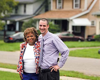 Lois Thornton, behavioral specialist, and Michael Flood, Taft Elementary School principal, treat the South Side school as a family. The school saw the biggest improvement of the city schools on the latest state report card, rising three spots to an “effective” designation.