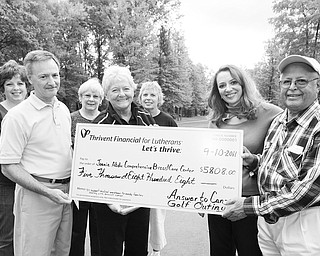 JESSICA M. KANALAS | THE VINDICATOR ..Chris Partika, committee member; Jack Nock, Mahoning Co. chapter of Thrivent Financial; Marilyn Johnson, committee member; Lynne Grischow, committee chair and Bedford Trails owner; Sherry Giovanni, committee member; ..present check for $5,808 to..Gina Marinelli, HMHP Foundation; Dr. Rashid Abdu, honorary chairman of the campaign for the Joanie Abdu Comprehensive Breast Care Center..**92 golfers attended "Answer to Cancer" golf outting on September 10...-30