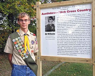 JESSICA M. KANALAS | THE VINDICATOR ..Senior at Austintown Fitch Alexander While created a commemorative sign that was placed in Austintown Township Park that remembers Ed Wilhelm, a Fitch alumni, who died in Texas trying to save the life of a stranger who was drowning.