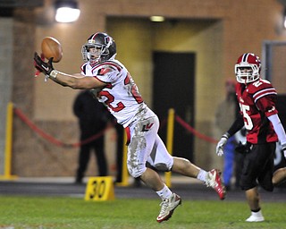 Running back Matt Szorady #22 of Labrae goes up for the catch.