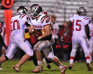 Running back Matt Szorady #22 of Labrae runs the ball upfield for postive yardage.