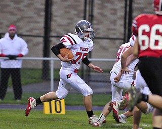 Defensive linemen Nate Middleton returns an interception down inside the Struthers 10 yardine.