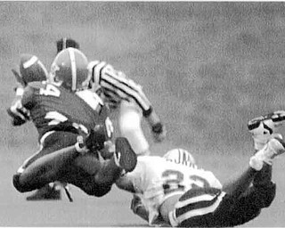 01/17/91 - Doug Oster.The Catch: Herb Williams makes the play off the game tto keep YSU alive. Chuck Murrya of Villanova is defending. On 4th and 11 with 1:12 left and YSU down by two, Ray Issac threw a pass to Williams. He had contact with the defender and the ball was tipped and on the way back down, Williams made the catch.