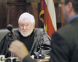 Visiting Judge William H. Wolff Jr. listens intently during a Monday hearing on whether records in the dismissed Oakhill Renaissance Place criminal conspiracy case should be sealed from public view.