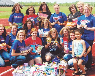Team donates supplies to female troops: Members of the Western Reserve High School 2011 softball team participated in its second annual service learning project, this year donating supplies for female military troops serving overseas. Coach Stephanie Wallace oversaw the project, collected all of the items from the girls and their families, and sent more than 180 items to the USO of Northern Ohio to be packaged and delivered. Other coaches are Laura Amero, Jen Paris and Gene Bogden.