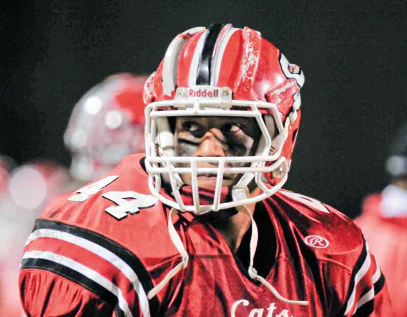 Struthers running back Dave Stewart (44) wears a football helmet outfi tted with Shockstrips™, a patent-pending sports product developed by Dr. Steven D. Novicky and his wife, Kim, of Canfield, which may help prevent brain injuries in young athletes by raising the level of protection provided by virtually any helmet, be it for football, hockey, baseball, lacrosse or cycling.