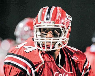 Struthers running back Dave Stewart (44) wears a football helmet outfi tted with Shockstrips™, a patent-pending sports product developed by Dr. Steven D. Novicky and his wife, Kim, of Canfield, which may help prevent brain injuries in young athletes by raising the level of protection provided by virtually any helmet, be it for football, hockey, baseball, lacrosse or cycling.