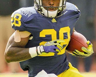 Liberty High graduate Fitzgerald Toussaint, a redshirt sophomore, has shaken off some shoulder injuries to become the secondary running threat in the Michigan Wolverines’ off ense this season.