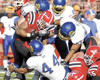 Youngstown State running back #35 Jamaine Cook is tackled by South Dakota State defenders #44 Ross Shafrath, #46 Jake Steffen, #27 Je Ryan Butler, and #22 Anthony Wise.