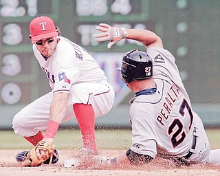 Detroit Tigers' Jhonny Peralta slides into second ahead of the tag of Texas Rangers' Ian Kinsler during the third inning of Game 2 of baseball's American League championship series Monday, Oct. 10, 2011, in Arlington, Texas. (AP Photo/Charlie Riedel)