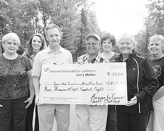The recent Answer to Cancer Golf Tournament at Bedford Trails Golf Course drew 92 golfers and raised $5,808 for the Joanie Abdu Comprehensive Breast Care Center at St. Elizabeth Health Center. Presenting the check recently to Dr. Rashid Abdu, center, honorary chairman of the fundraising campaign, and Humility of Mary Foundation development officer Gina Marinelli, second from left, are, from left, committee member Marilyn Johnson, Jack Nock of the Mahoning County Chapter of contributor Thrivent Financial, committee member Chris Partika, chairwoman and Bedford Trails owner Lynne Grischow, and committee member Sherry Giovanni. The ribbon-cutting at the new center will be Nov. 2. Photo by JESSICA M. KANALAS | THE VINDICATOR 