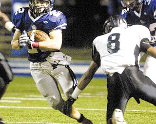 Poland’s Jerry Lawman scrambles in the Bulldogs’ Week 8 football game against the East Panthers on Thursday at Dave Pavlansky Field at Poland High School Stadium. The game was postponed by lightning, with Poland leading 14-7. The game has been rescheduled for today at 1 p.m. at Poland.