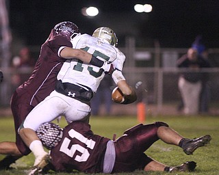 ROBERT K. YOSAY | THE VINDICATOR --..BIG SACK as Bdm #56 Justin Babos and #51 Zach Machuga takes down Glenoaks QB Reid Worstell for a big loss .Glen Oak vs Boardman at Boardman High School -..--30-..(AP Photo/The Vindicator, Robert K. Yosay)