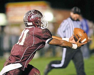 ROBERT K. YOSAY | THE VINDICATOR --..Tieing Score #21 Bdm devin Campbell bobbled the pass but was able to gain control and score to tie Glenoak 7-7 late in the second quarter-.Glen Oak vs Boardman at Boardman High School -..--30-..(AP Photo/The Vindicator, Robert K. Yosay)
