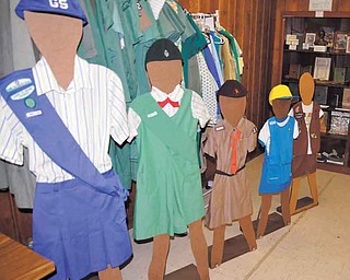 Girl Scout uniforms from the past and present are on display in the museum at the former Lake to River Girl Scout Council office on Warren Avenue in Niles.