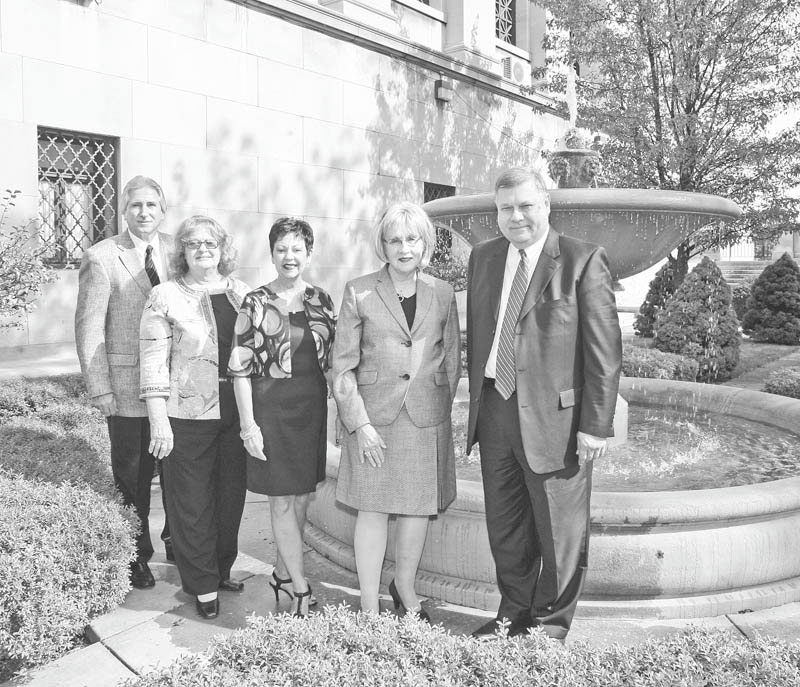 Looking ahead to Stambaugh Pillars' annual Holiday Fashion Show are, from left to right, Phil Cannati, executive director of Stambaugh Auditorium; Leilani Drake, event co-chairwoman; Judy Conti, fashion coordinator; Barbara Banks, co-chairwoman; and Mike Dwulit of Dillard's.